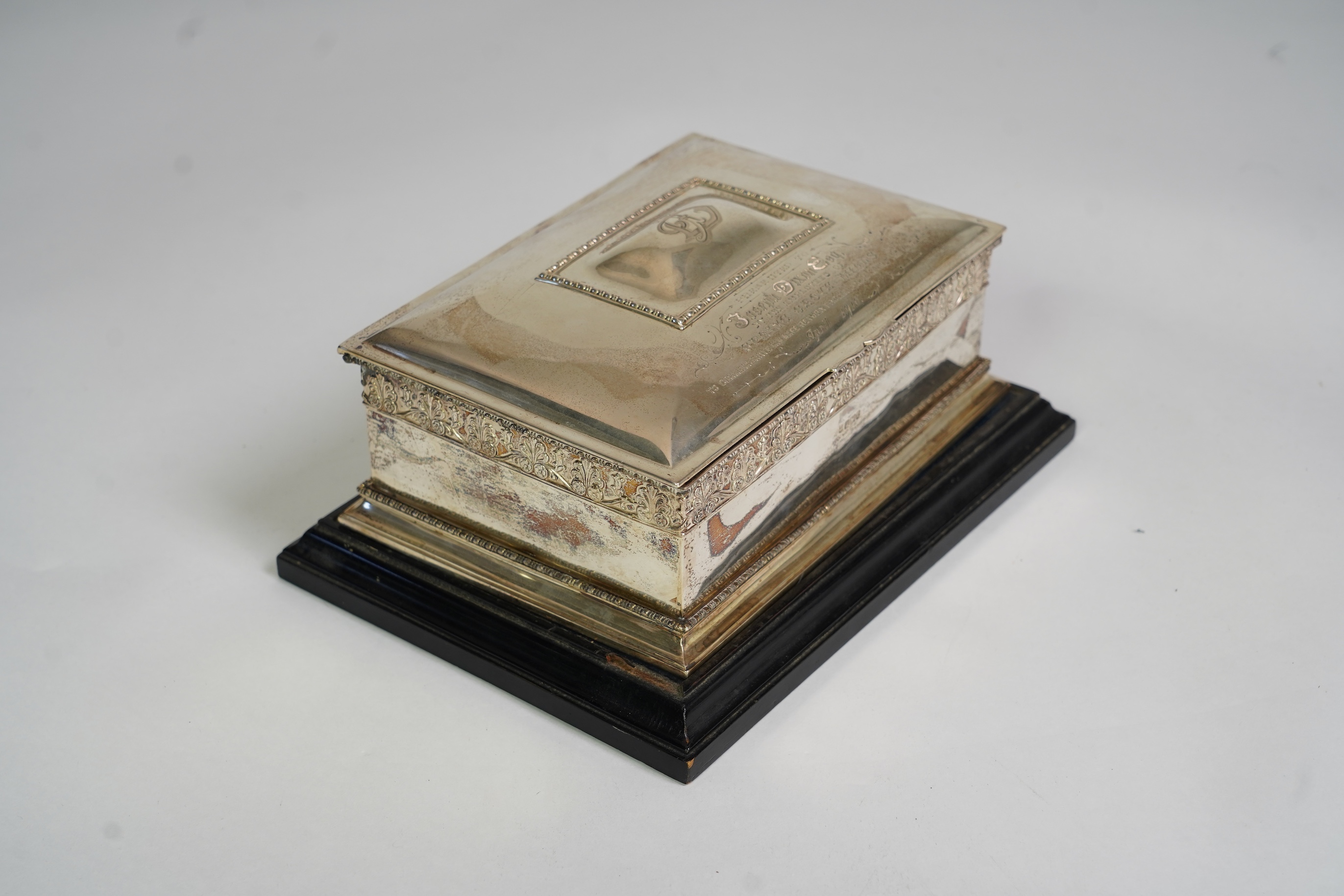 An Edwardian silver presentation cigar box, by Cooper Brothers and Sons